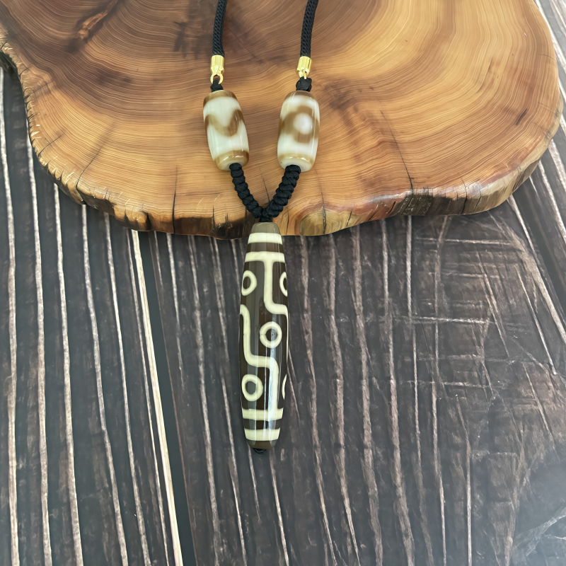 牙黄折线九眼天珠-竖款-男女通用